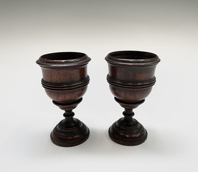 Lot 154 - A pair of Victorian turned treen goblets,...