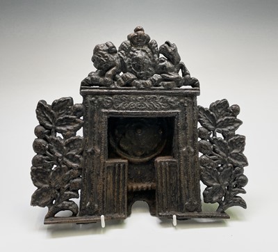 Lot 170 - A Victorian cast iron miniature fireplace,...