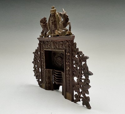 Lot 171 - A Victorian cast iron miniature fireplace,...
