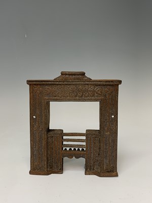 Lot 172 - A Victorian miniature cast iron fireplace,...