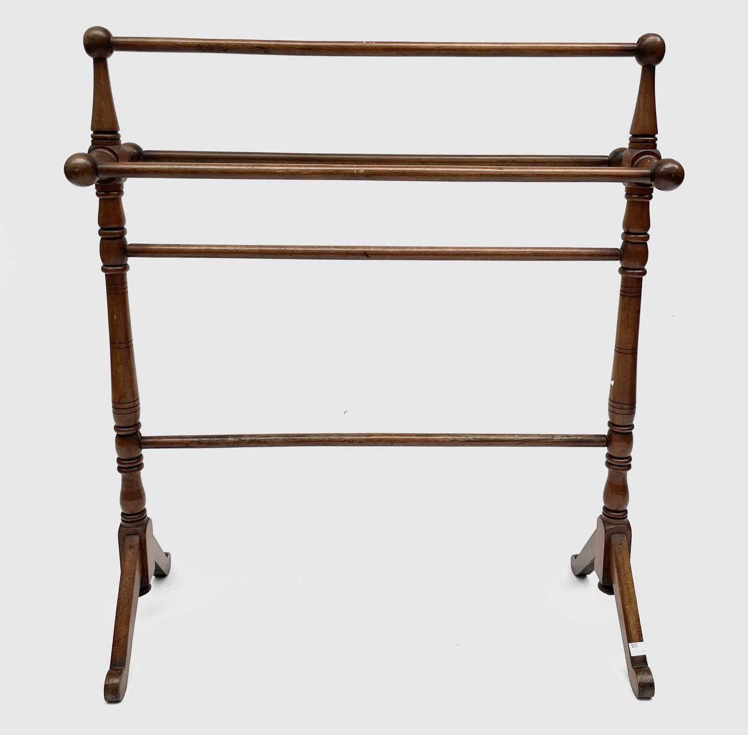 Lot 3222 - A Victorian walnut towel rail, width 75.5cm.