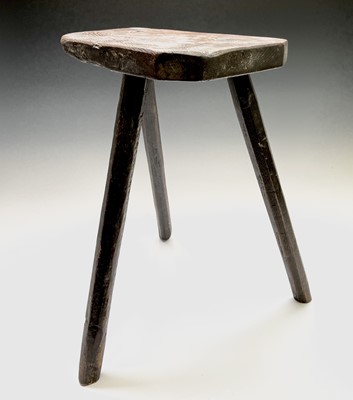 Lot 222 - An elm and oak milking stool, 19th century,...