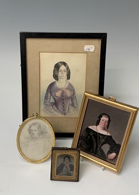 Lot 335 - Four portrait miniatures of ladies, one being...