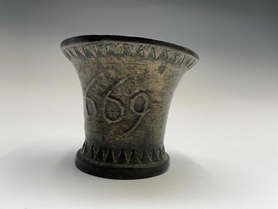 Lot 115 - A 17th century bronze pestle and mortar,...