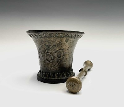 Lot 115 - A 17th century bronze pestle and mortar,...