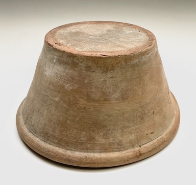 Lot 529 - A terracotta farming pan, with glazed interior...