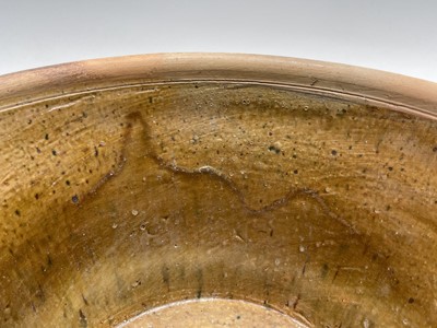 Lot 529 - A terracotta farming pan, with glazed interior...