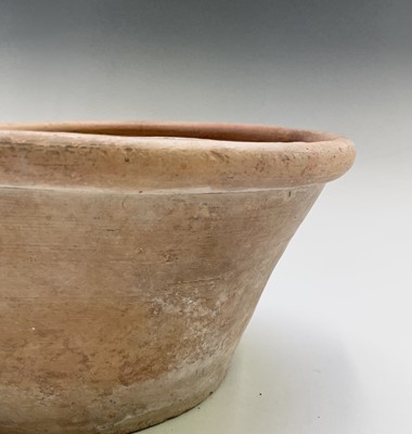 Lot 529 - A terracotta farming pan, with glazed interior...