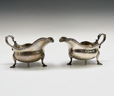 Lot 360 - A pair of silver sauceboats in mid...