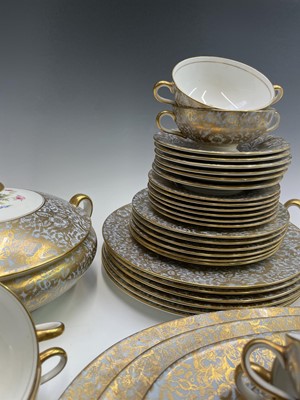 Lot 936 - A Minton dinner service, pattern no. H5066,...