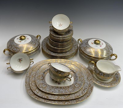 Lot 936 - A Minton dinner service, pattern no. H5066,...