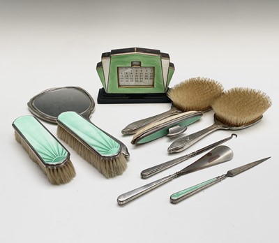 Lot 395 - A silver and green enamel dressing table set -...