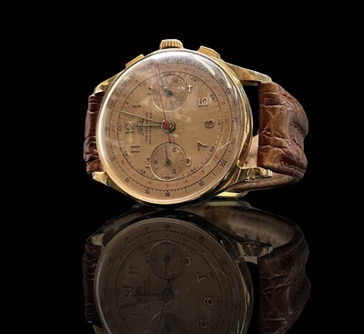 Lot 31 - An Egona 18ct gold chronograph wristwatch with...