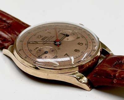 Lot 31 - An Egona 18ct gold chronograph wristwatch with...