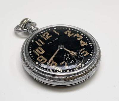 Lot 217 - A Waltham military pocket watch with black...