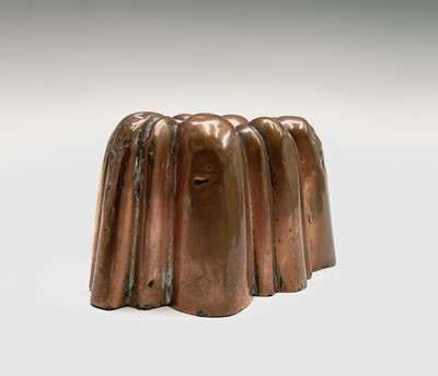 Lot 168 - Two Victorian copper jelly moulds, one with a...