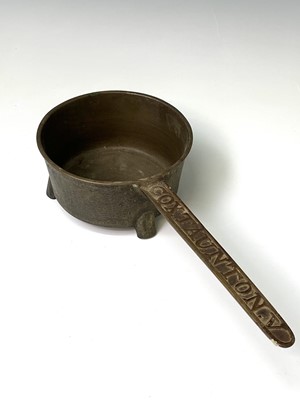 Lot 129 - An 18th century bell metal skillet, by Cox of...