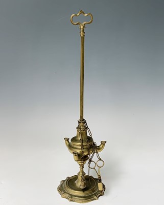 Lot 124 - A brass Lucerna oil Lamp, early 19th century,...