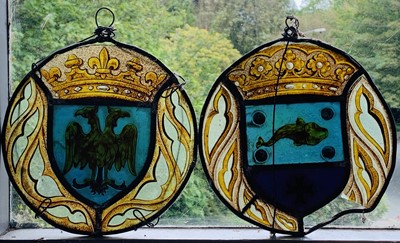 Lot 123 - Two stained glass circular panels, 19th...