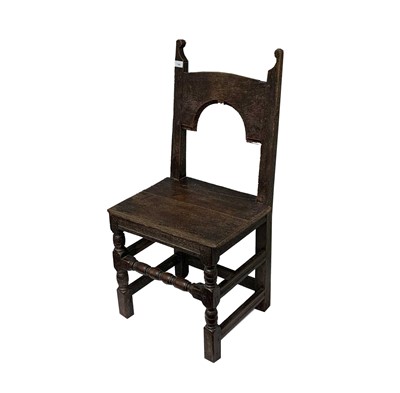 Lot 199 - A 17th century oak hall chair, with a...