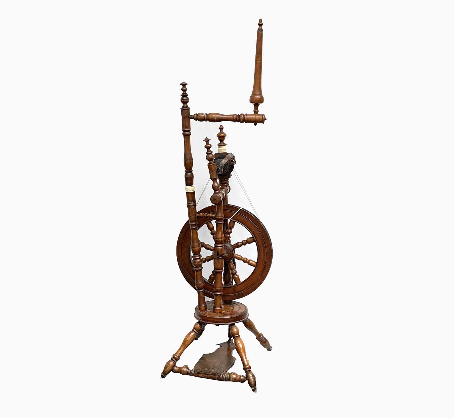 Lot 198 - A beech saxony spinning wheel, 19th century,...