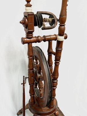 Lot 198 - A beech saxony spinning wheel, 19th century,...