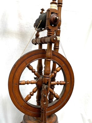 Lot 198 - A beech saxony spinning wheel, 19th century,...