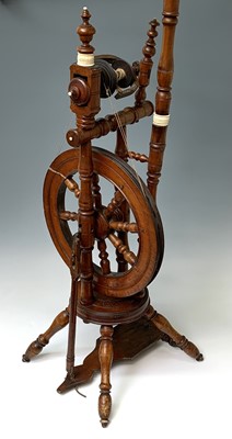 Lot 198 - A beech saxony spinning wheel, 19th century,...