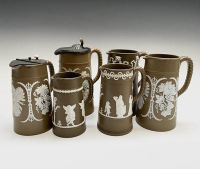 Lot 495 - Three Paxton jasperware harvest jugs and three...