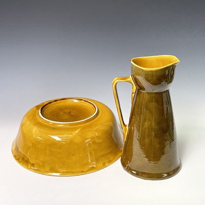 Lot 822 - A Royal Doulton jug and bowl set, both painted...
