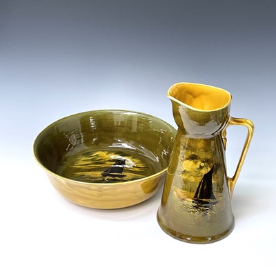 Lot 822 - A Royal Doulton jug and bowl set, both painted...