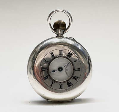 Lot 30 - A small silver half-hunter cased pocket watch...