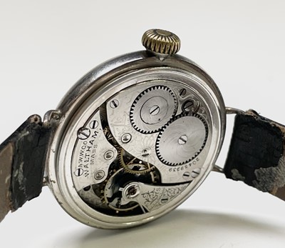 Lot 8 - A Waltham silver trench cased wristwatch the...