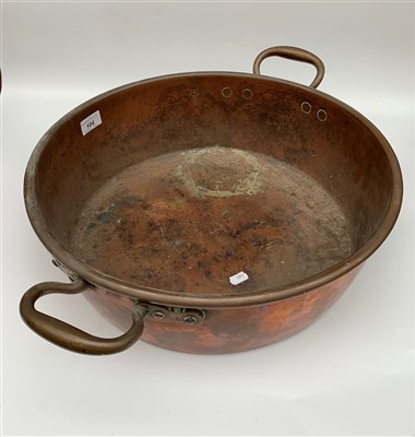 Lot 104 - A large Victorian circular copper twin handled...