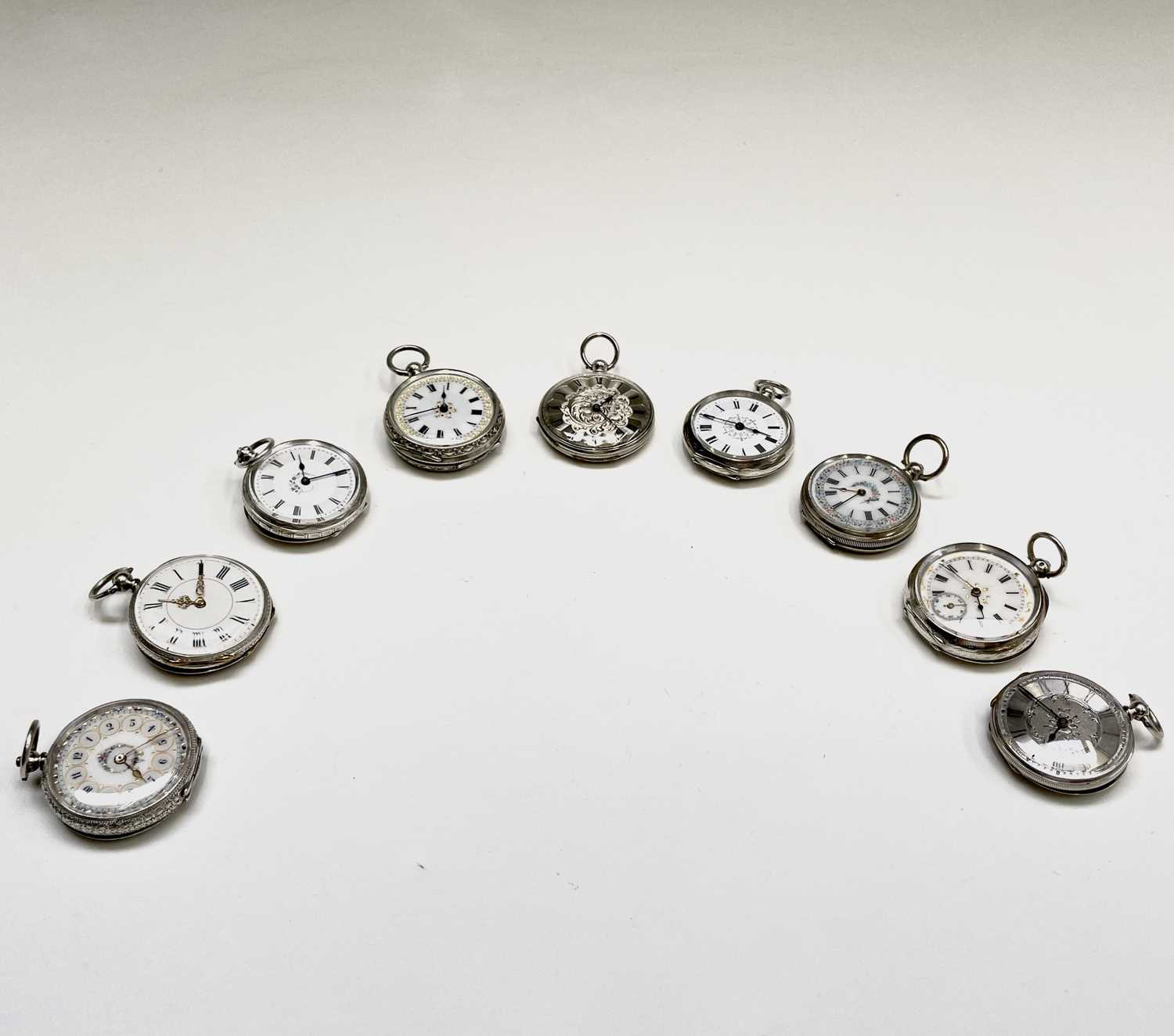 Lot 87 - Nine key-wind silver fob watches.