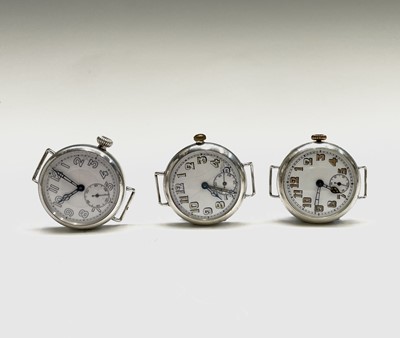 Lot 193 - Three silver trench cased wristwatches each 33....