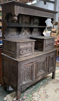 Lot 118 - A carved oak tridarn, 17th century, the top...