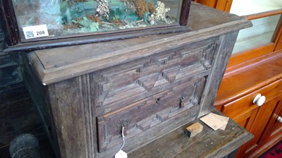 Lot 118 - A carved oak tridarn, 17th century, the top...
