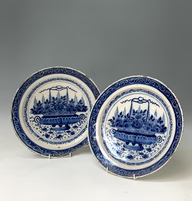 Lot 233 - A pair of Dutch Delft blue and white plates,...