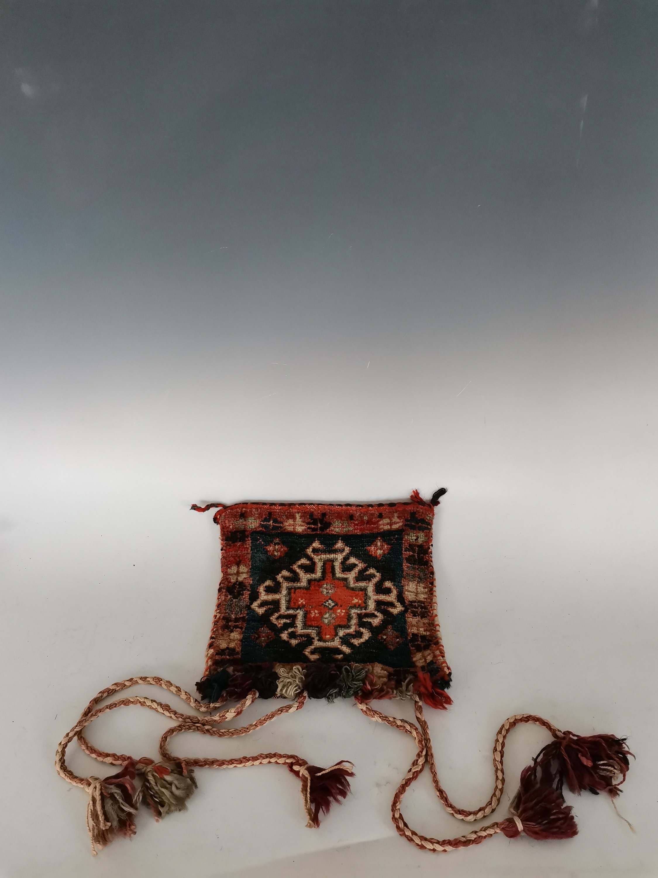 Lot 116 A Persian saddle bag.
