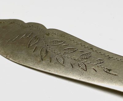 Lot 429 - An engraved silver butter knife with ivory...