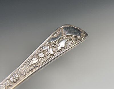 Lot 429 - An engraved silver butter knife with ivory...