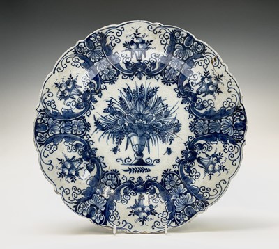 Lot 251 - A Dutch Delft dish, 18th century, painted in...