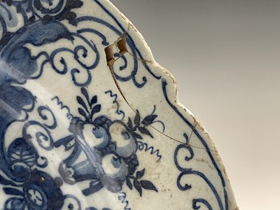 Lot 251 - A Dutch Delft dish, 18th century, painted in...