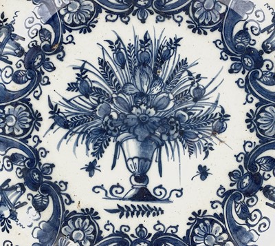 Lot 251 - A Dutch Delft dish, 18th century, painted in...