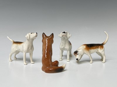 Lot 857 - Three Beswick foxhounds and a Beswick seated...