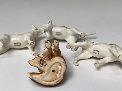 Lot 857 - Three Beswick foxhounds and a Beswick seated...