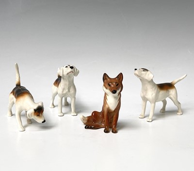 Lot 857 - Three Beswick foxhounds and a Beswick seated...