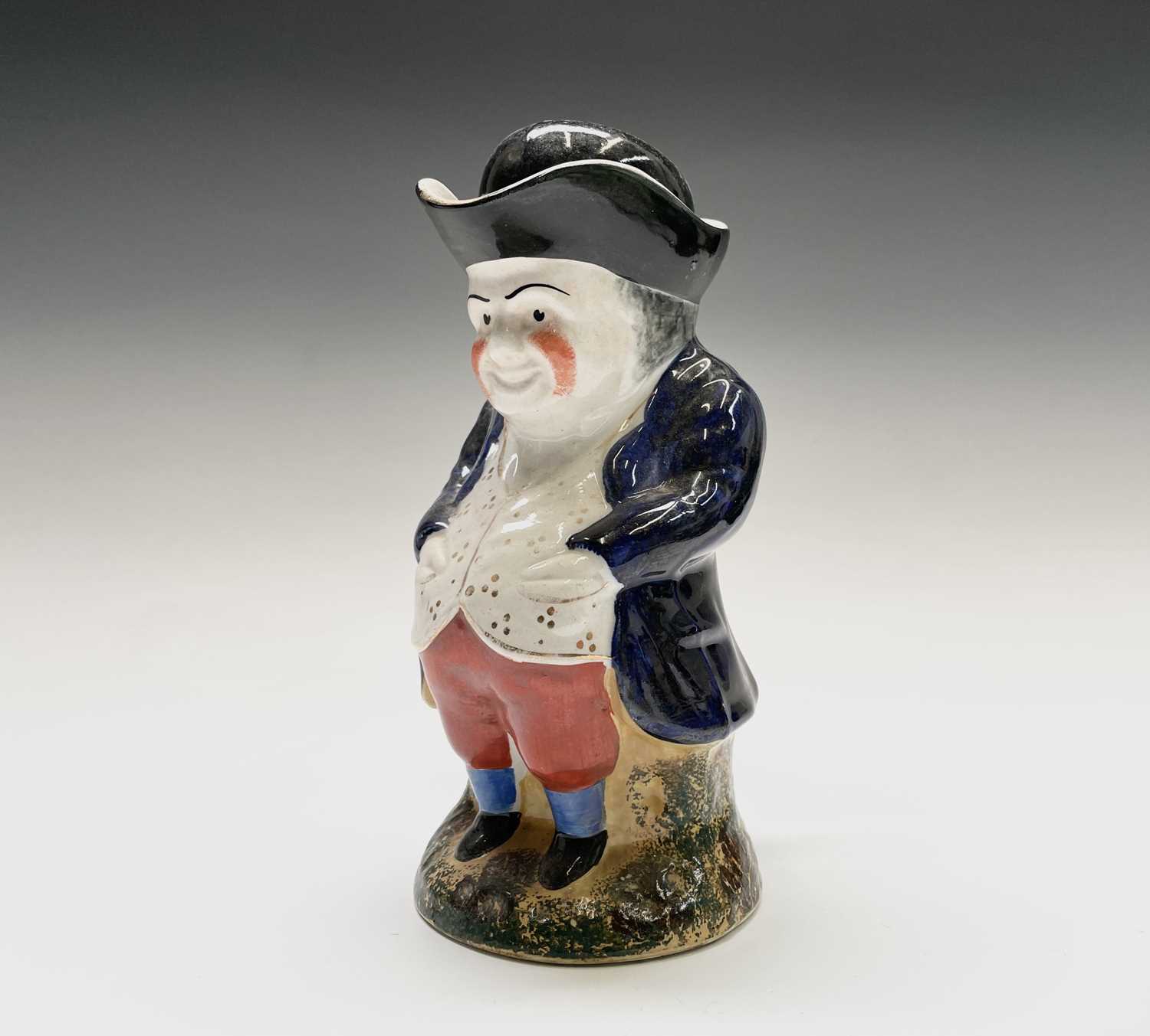 Lot 290 - A Staffordshire pottery Toby jug, early 19th...