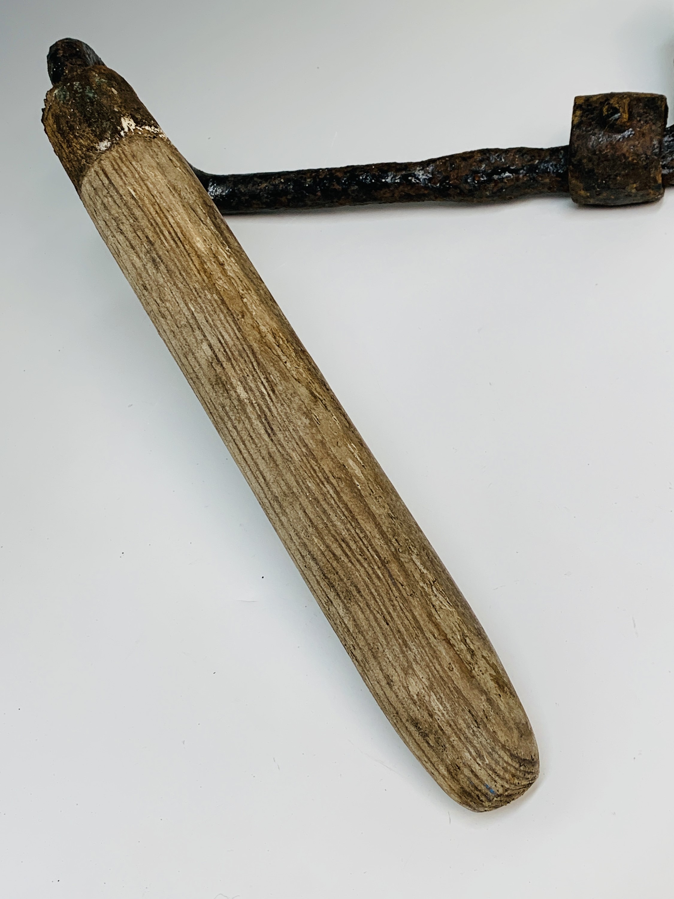 Lot 319 - A hay knife, circa 1900, with black painted